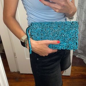 New with tags, black clutch with turquoise beads